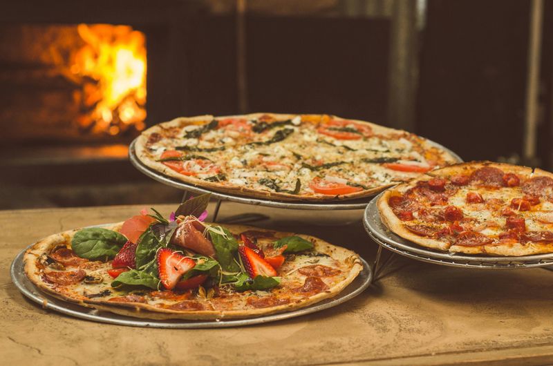 Fresh ingredients and pizza making
